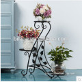 wrought iron flower plant shelf